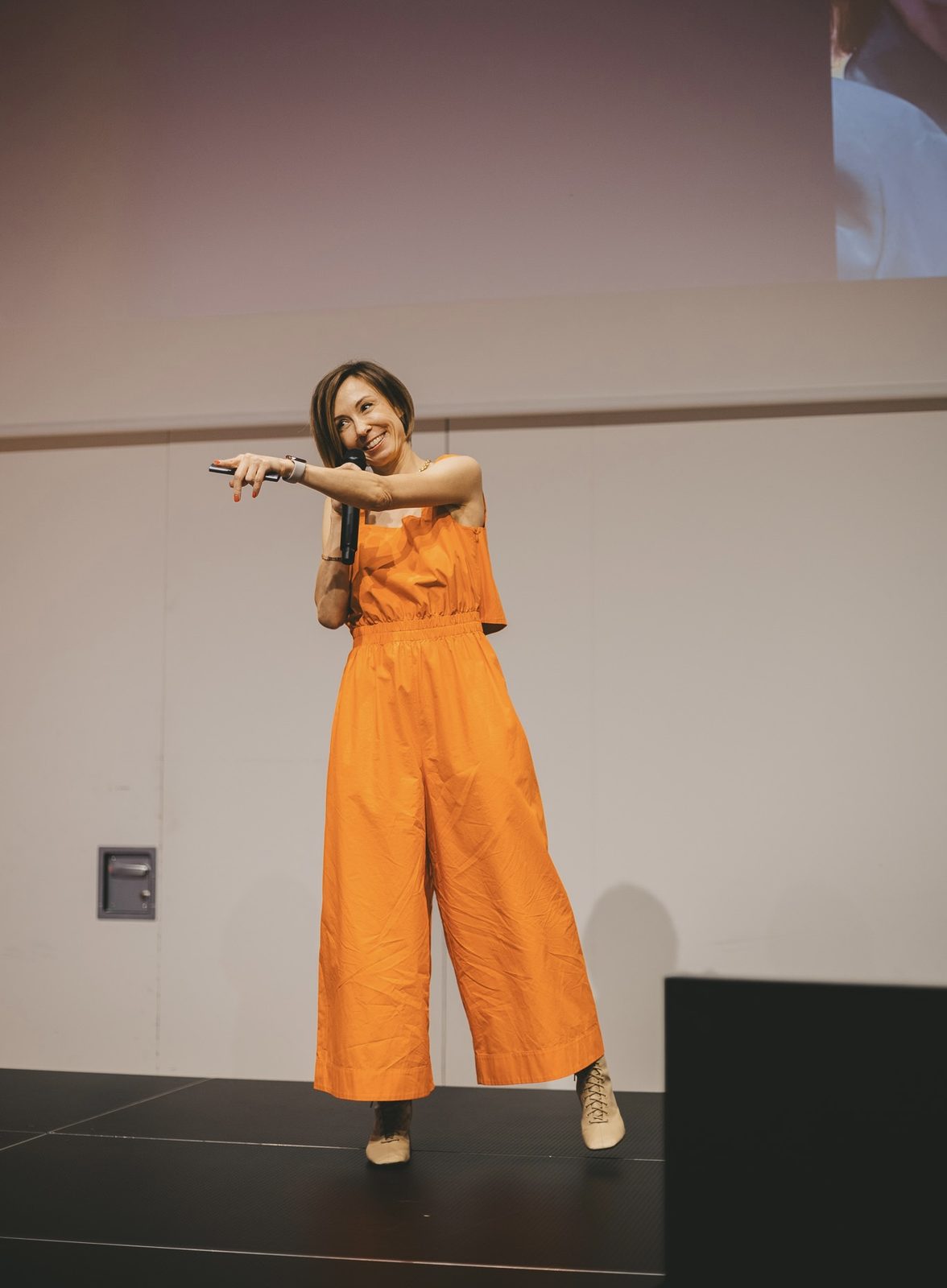 Daria Isaeva speaking on stage